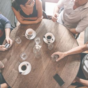 Friends around a coffee table