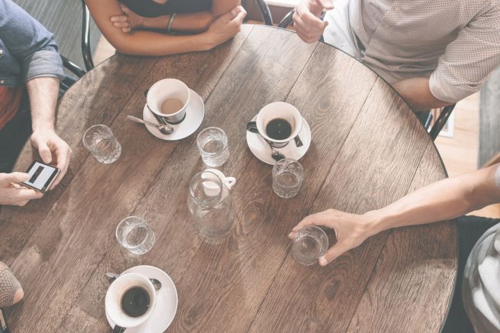Friends around a coffee table